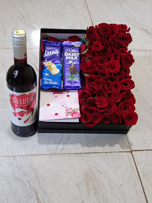CHOCOLATES & RED ROSES BOX ARRANGEMENT WITH DELUSH RED WINE