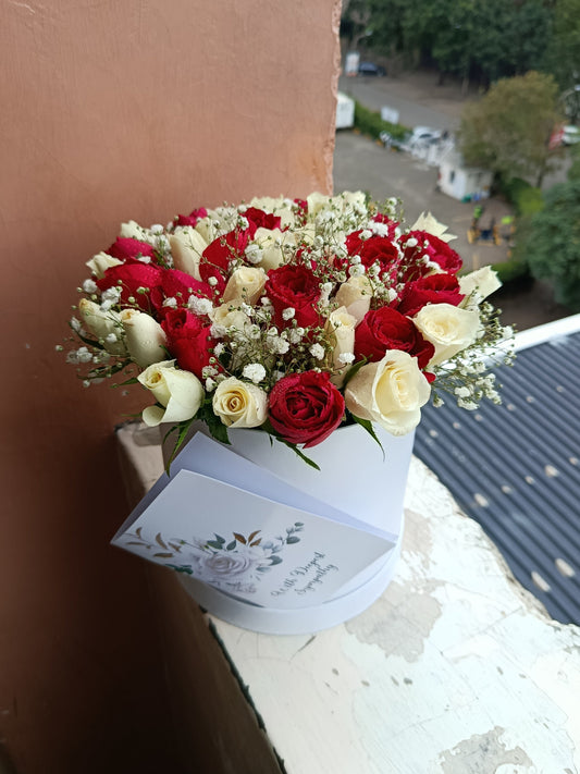RED & WHITE ROSES WITH BABY BABY BREATH ROUND BOX ARRANGEMENT